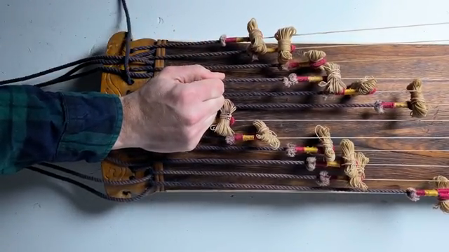 First, tuning by simply pulling on these ropes is very inaccurate. And second, and much more important, it's too much tension, the strings…